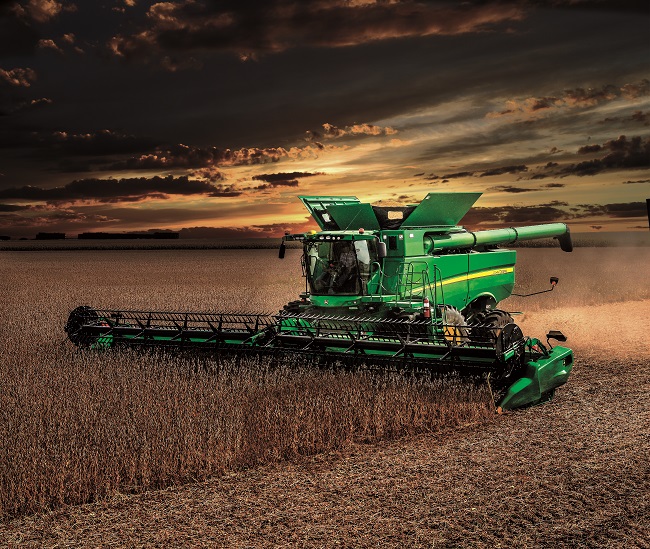 John Deere Harvester and Front-end equipment ready to harvest profits